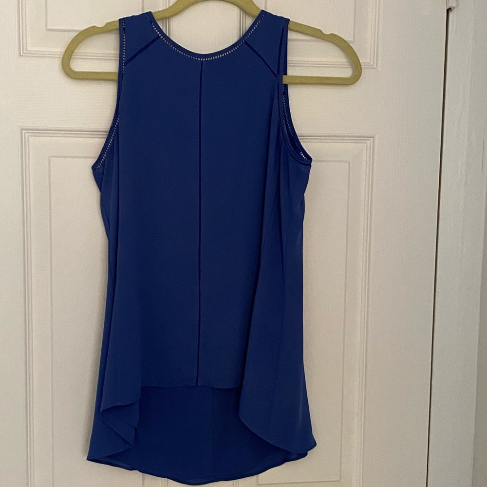 Two sleeveless work blouses